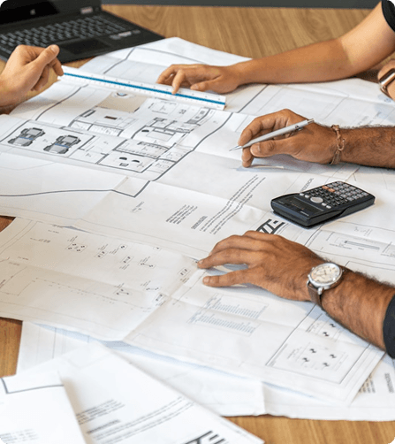 Construction jobsite with blueprints and tools