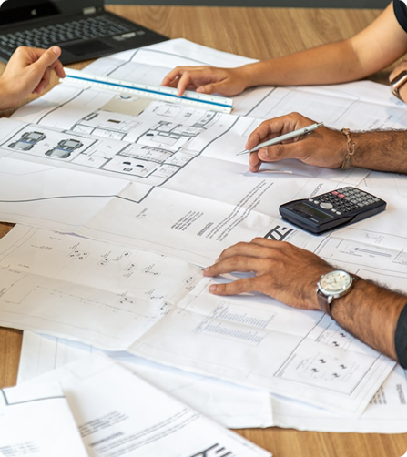 Construction jobsite with blueprints and tools